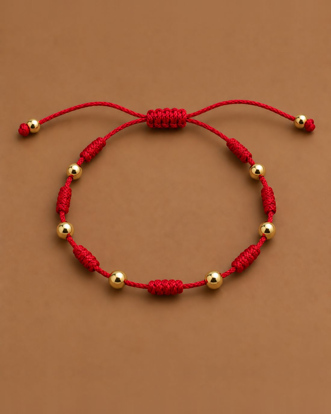Pulsera 7 nudos roja con oro, foto 1 de 2