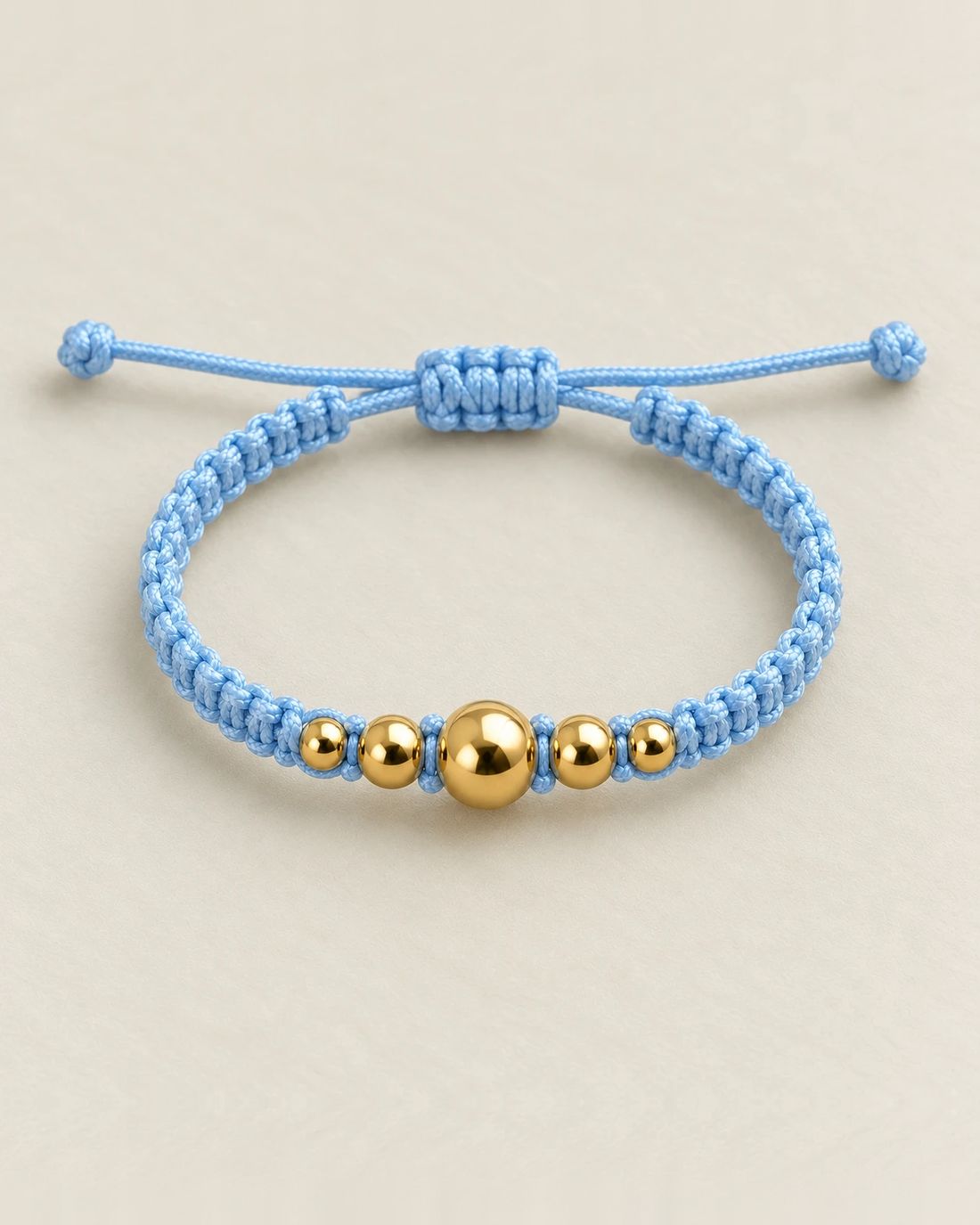 Pulsera de balines de oro 14k, cordón celeste, foto 1 de 2
