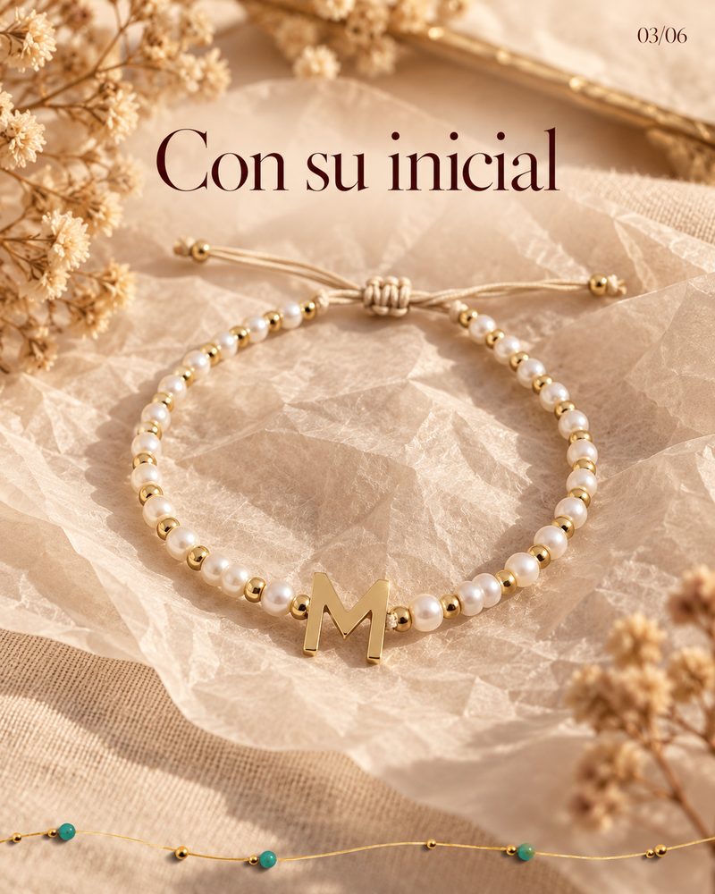 Con su inicial
