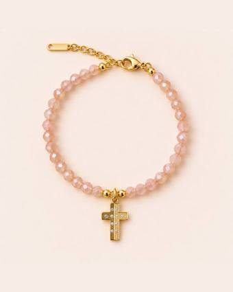 Pulsera rosa con cruz dorada