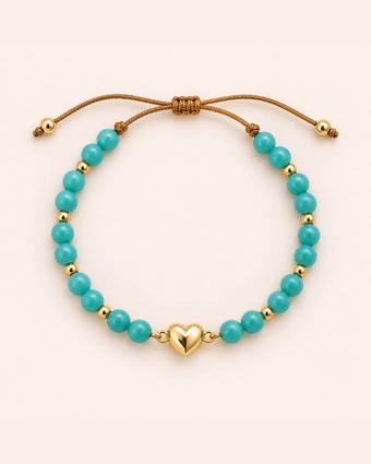 Pulsera turquesa con corazón dorado