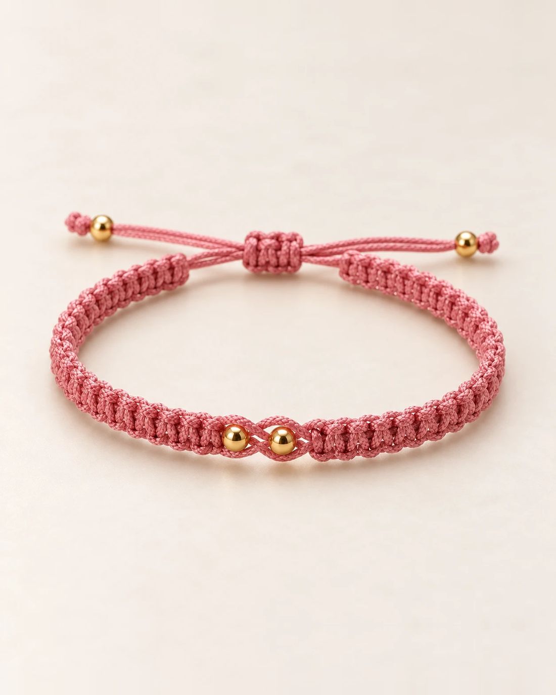 Pulsera hilo rosa con balines de oro 14k, foto 1 de 2