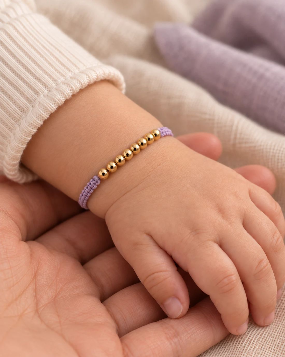 Oro Lila, puesta en la muñeca