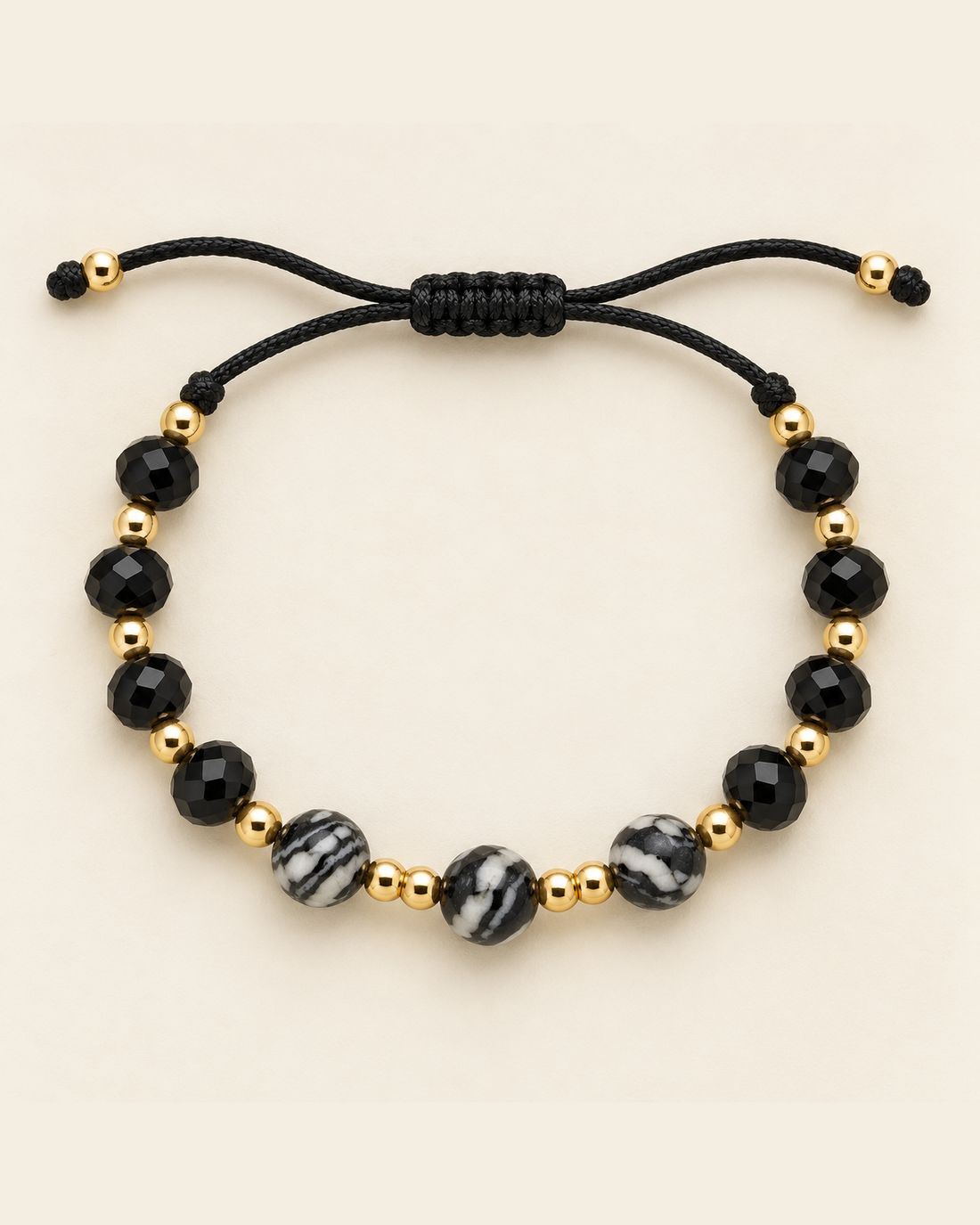 Pulsera de ónix y cuentas veteadas