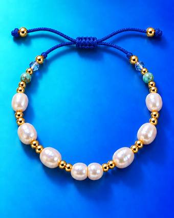 Pulsera de perla natural, cordón azul