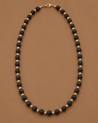 Collar de piedra volcánica y oro