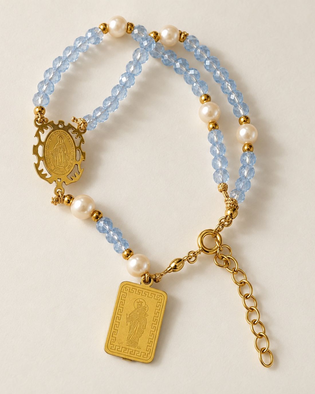 Pulsera rosario Milagrosa azul hielo