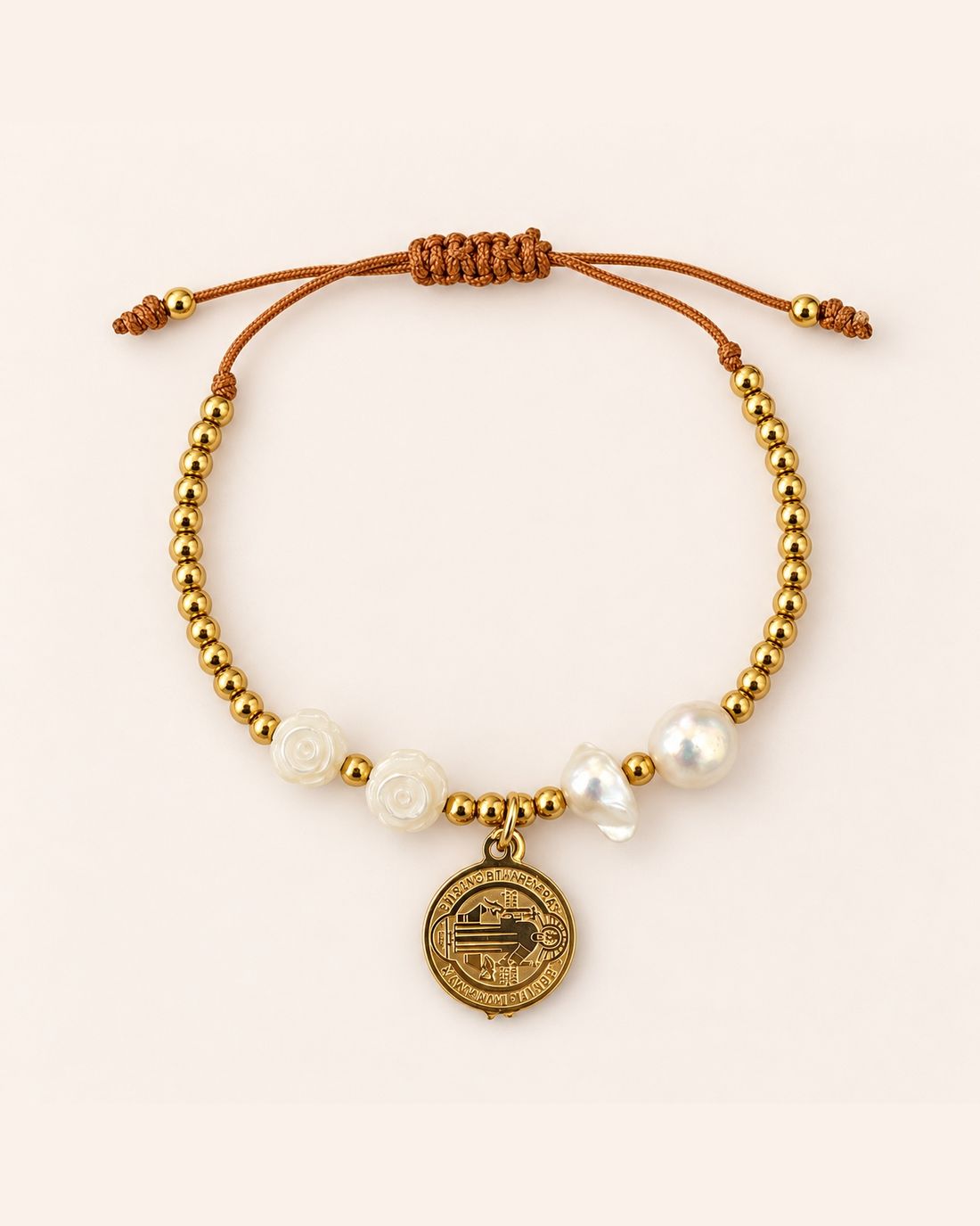 Pulsera San Benito con perlas y balines, foto 1 de 2